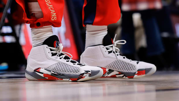 New Orleans Pelicans forward Brandon Ingram's white and black Air Jordan sneakers.